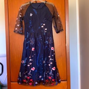 NEW Dressy mesh embroidered navy floral dress.fully lined. Never worn.